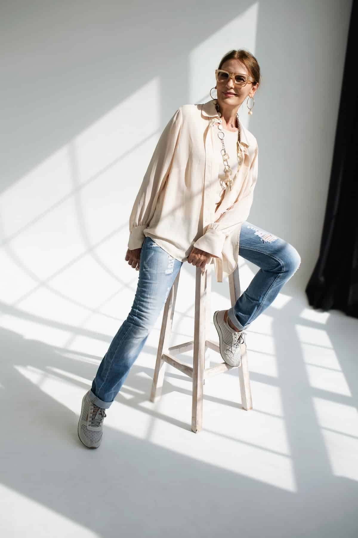 beautiful mature woman sitting on stool