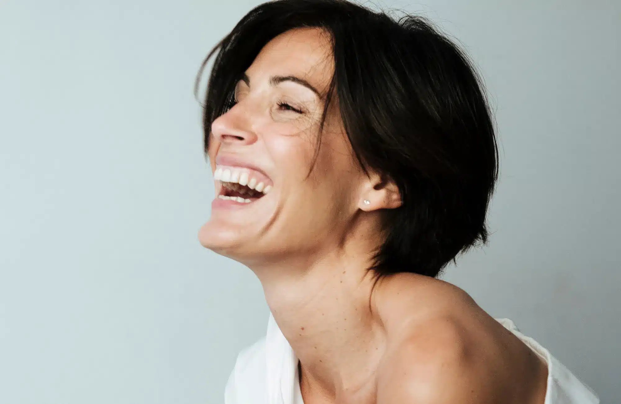 Services 13 beautiful mature woman smiling with glowing skin