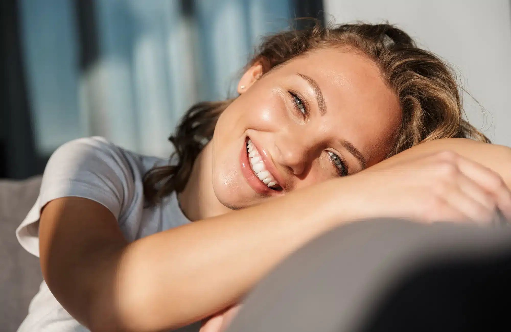 Services 28 smiling pretty blonde young woman wearing casual clothes